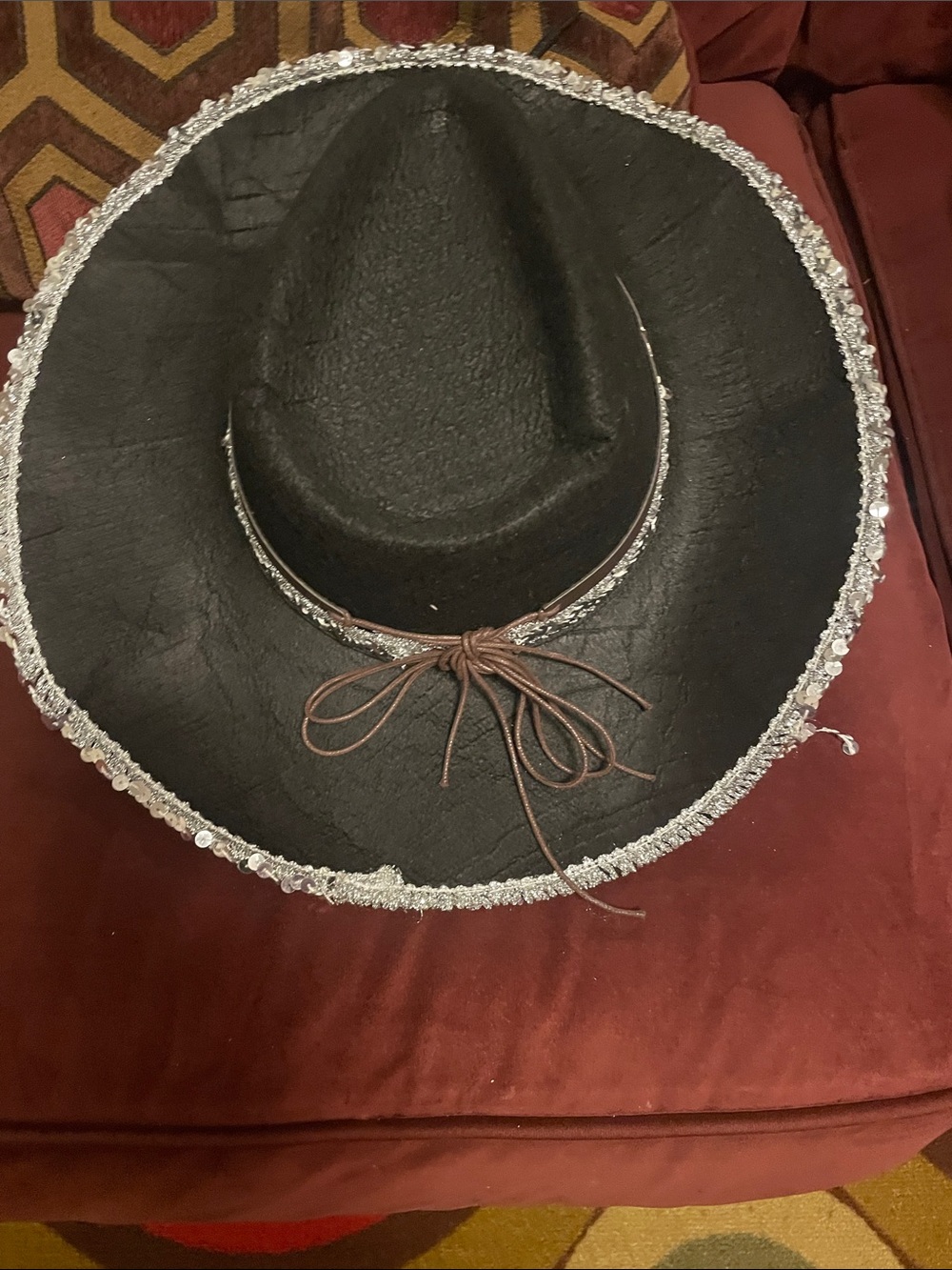 Black Western Hat with Silver Sequin Trim and Brown Chin Tie
